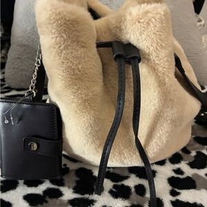 Elegant Cream Faux Fur Bucket Bag with Black Accents